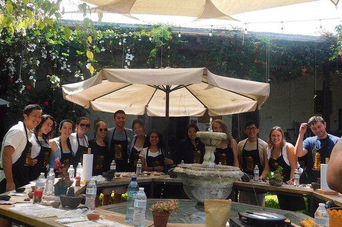 Discover Chocolate Making in Antigua Guatemala - Roasting cacao beans and removing the husks