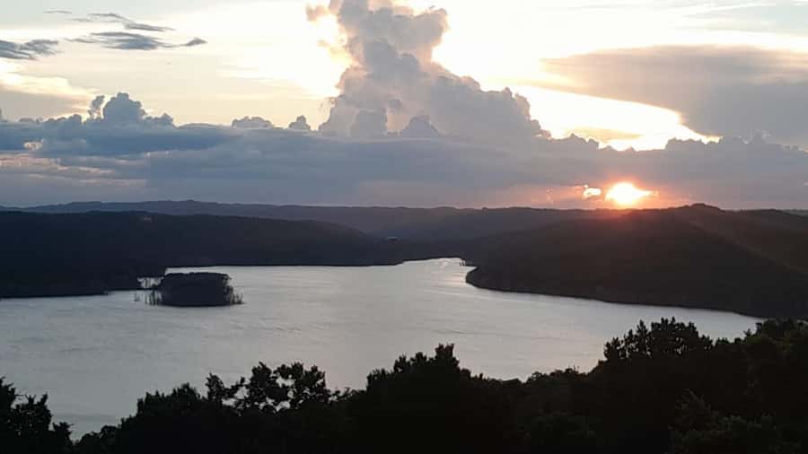 Flores: Yaxha Shared Sunset Tour with Transportation & Guide - Buying the park ticket at the visitor center