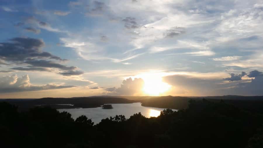 Flores: Yaxha Shared Sunset Tour with Transportation & Guide - The sunset at Structure 216