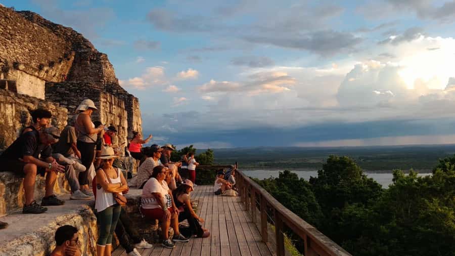 Flores: Yaxha Shared Sunset Tour with Transportation & Guide - Meeting in Flores and getting on the road