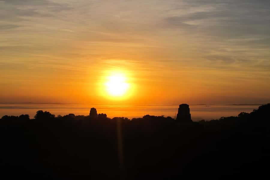 From Flores: Tikal Ruins Sunrise Guided Tour - Reaching Tikal from the Yo Amo Peten meeting point