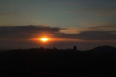 From Flowers Sunrise in Tikal and Sunset in Yaxha in a day