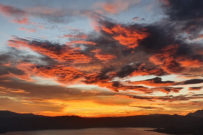 Mayan Nose Sunrise Hiking + Chichicastenango Market Tour - Sunrise above Lake Atitlan