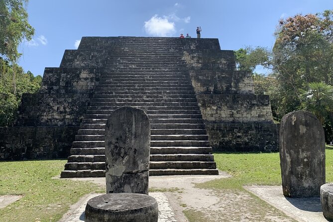 Private Tour of Tikal from Belize Western border - Entering Tikal National Park beneath the trees