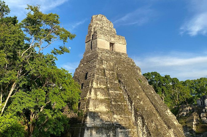 Private Tour to Tikal from Flores, all included. - Returning to Flores and handling a flight