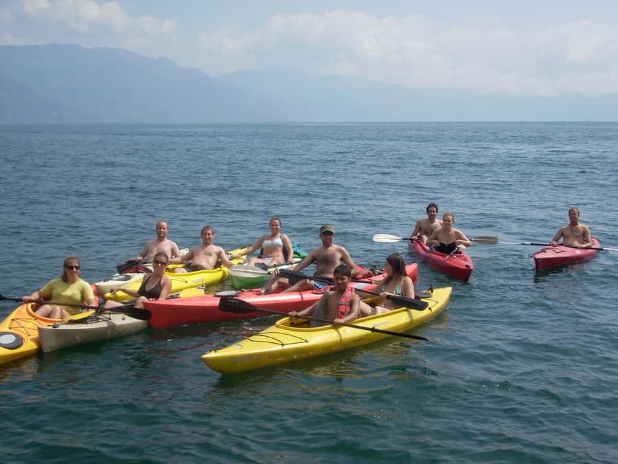 Santa Cruz La Laguna 6-Hour Adventure Activities Tour - San Marcos and the change from kayak to footpath