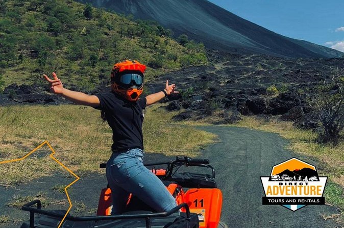 Tour to the foothills of the volcano on ATV - Pausing for photos with Pacaya ahead
